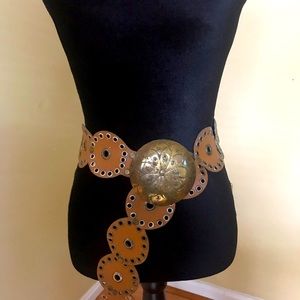 Brass buckle belt tan brown in one size.